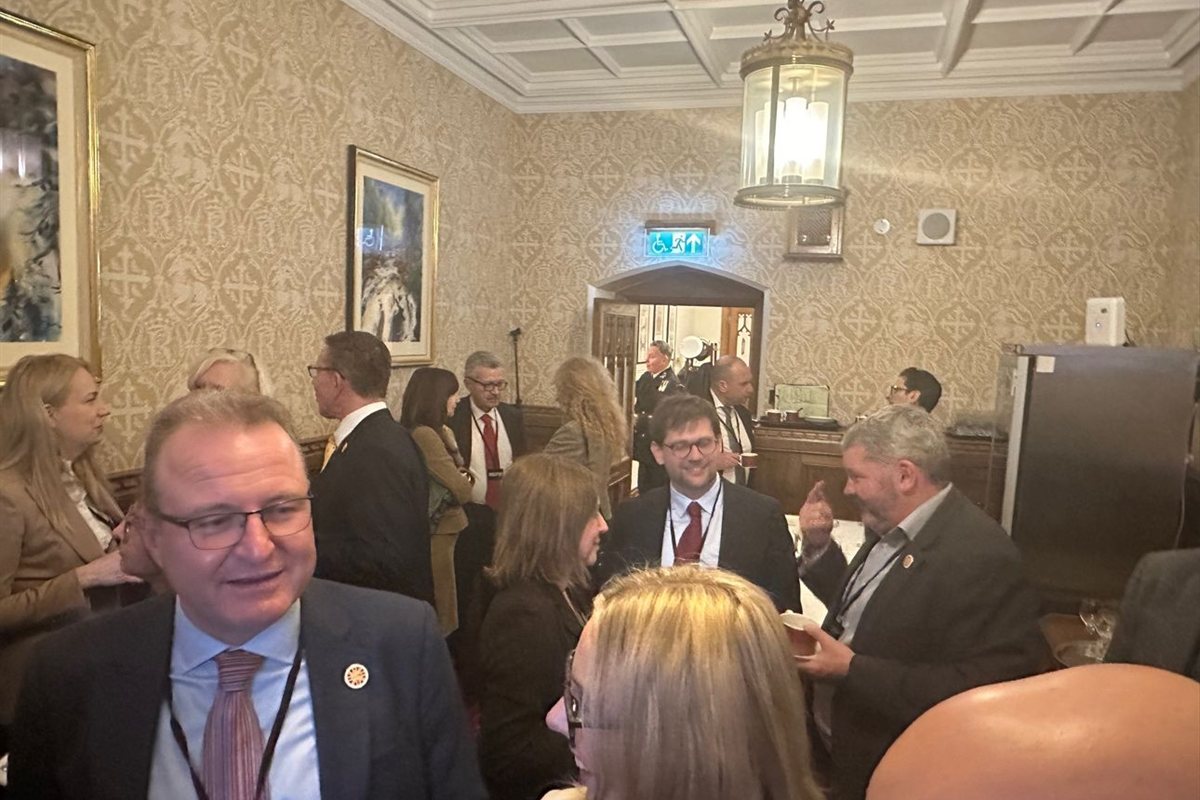 Delegates developing business relationships at a House of Lords reception