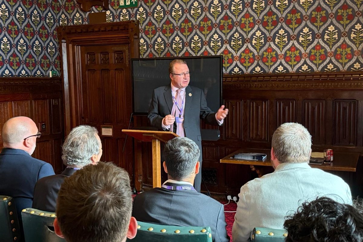 A speaker sharing business expertise at a House of Commons event